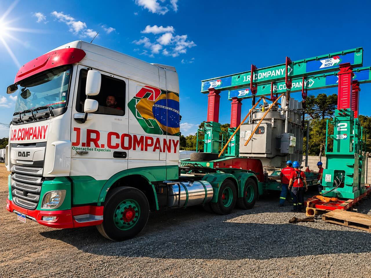 Operacao especial da J.R. Company com transporte de carga industrial em estrada de obra